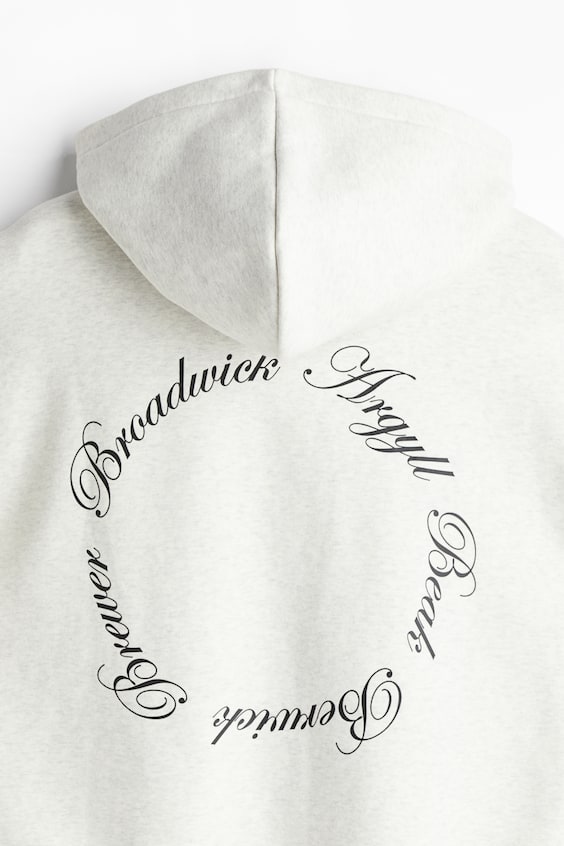 HM Bedruckter Hoodie in Oversized Fit Große Rabatte