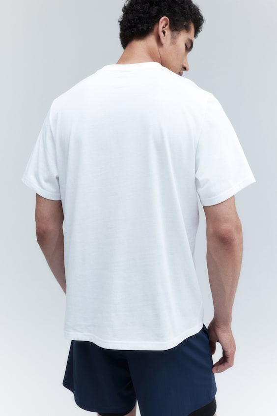 HM Sportshirt aus DryMove™ in Regular Fit Speichern exportieren