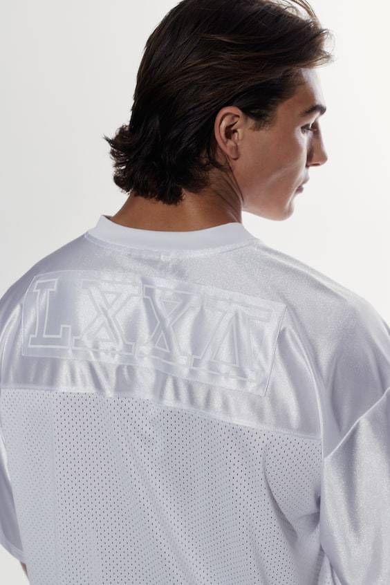 HM Loose Fit Printed sports top in DryMove™ 50% Rabatt für begrenzte Zeit