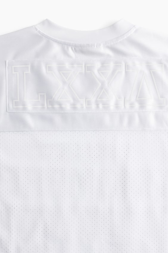 HM Loose Fit Printed sports top in DryMove™ 50% Rabatt für begrenzte Zeit