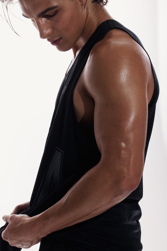 HM Oversized Fit Printed sports vest top in DryMove™ Rabatte dieses Monats