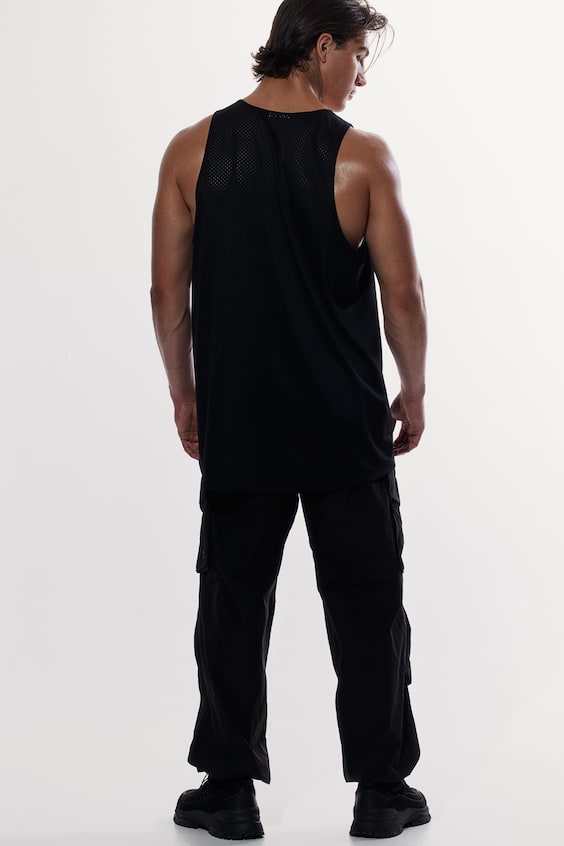HM Oversized Fit Printed sports vest top in DryMove™ Rabatte dieses Monats