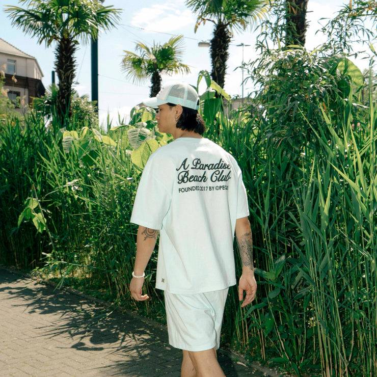 Pequs A Paradise Beach Club Back Logo T-Shirt zollfrei